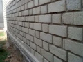 Geopolymer Building Blocks for Sustainable Masonry Construction