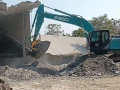 MB Crusher Bucket Optimizes M-Sand Production for Road Projects